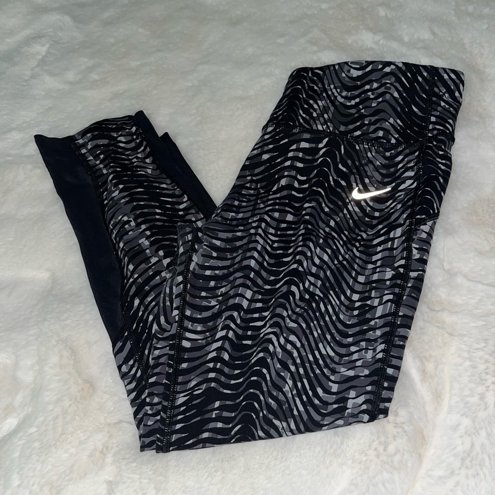 Women size large compression Nike running leggings.